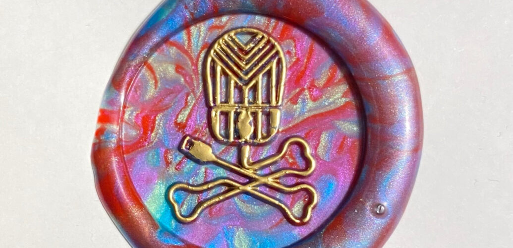 DDoSecrets wax seal made by Milo Trujillo